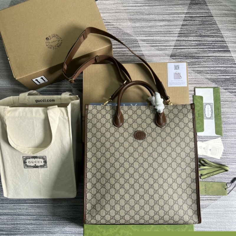 G*u*i shopping bags